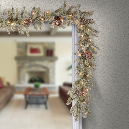 9' X 10" Pre-lit Dunhill® Fir Artificial Christmas Garland with Snow, Red Berries, Cones and 50 Clear Lights